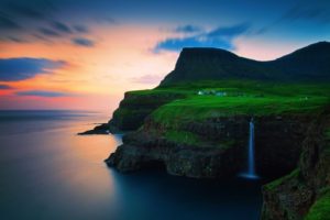 Green Cliff Over Ocean