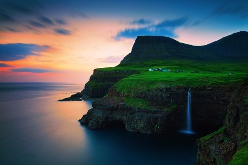 Green Cliff Over Ocean